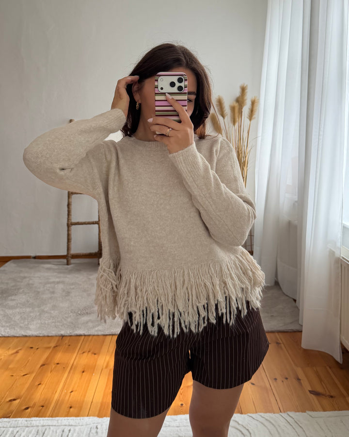 Strickpullover mit Fransensaum in Beige